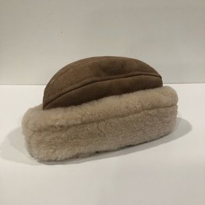 A Sickafus sheepskin/shearling hat never used size M